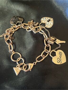 Guess Gold Tone Heart & Key Charm Bracelet